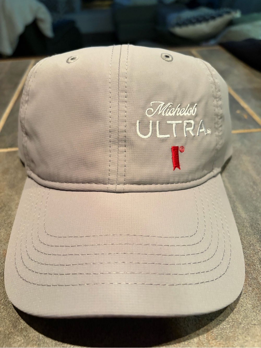 NWOT Men's Light Gray Baseball Cap with Embroidered Logo-